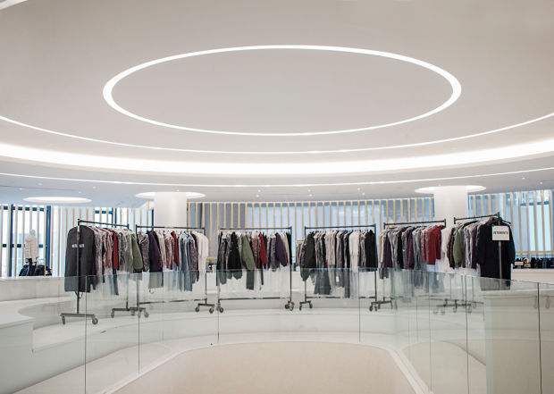Racks of clothes inside Saks Fifth Avenue's new store. 