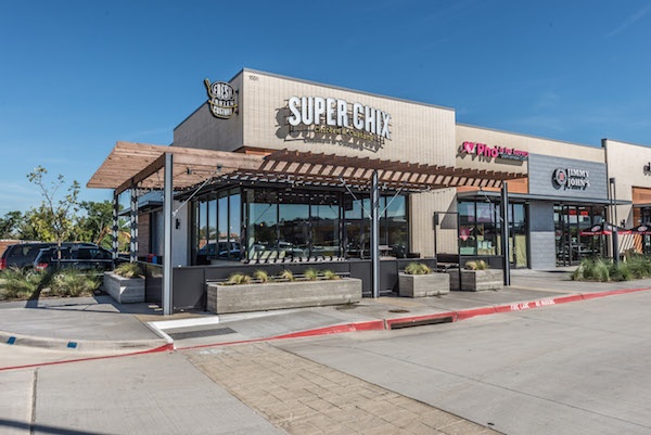 Outside shot of Super Chix in a shopping center. 