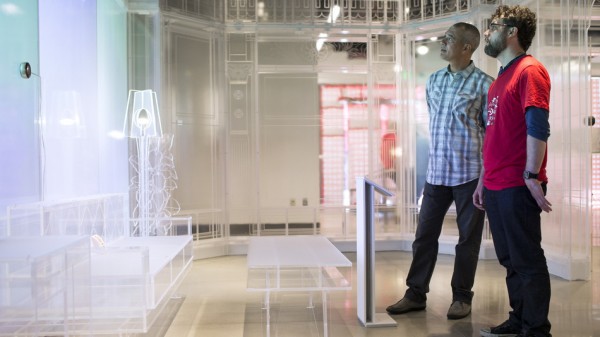 Two men looking at a futuristic-looking display in Target's Open House concept store