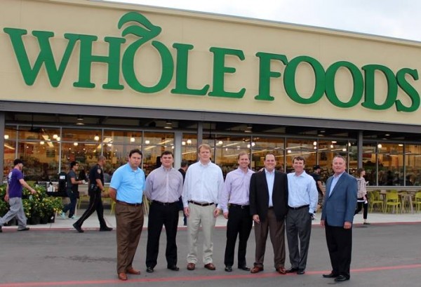 Woodway Whole Foods Voss Grand Opening with development team in front the storefront