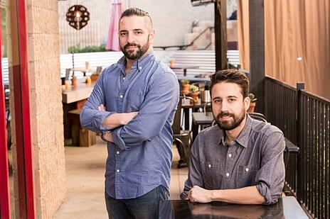 Slapfish owners Andrew Gruel and Jethro Naude inside restaurant