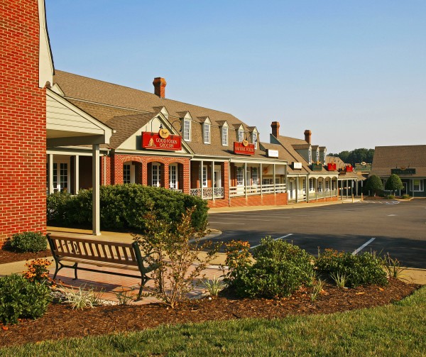 Red brick storefronts at Gayton Crossing