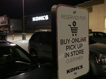 Kohll's parking spot sign that is reserved for a customer who purchased online and is picking up in store