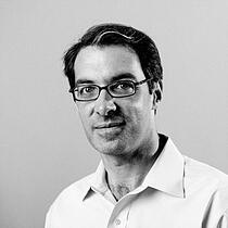 black and white headshot of Chris Widmayer