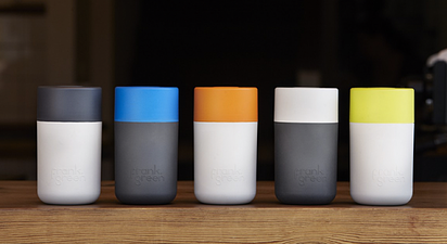 Array of crank green environmentally friendly cups in gray, white, orange, blue and yellow colors
