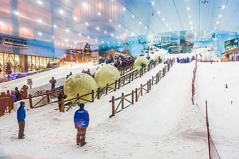 Inside a huge mall that has man-made ski slopes made of fake snow