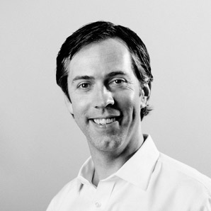 Black and white headshot of John Mehigan