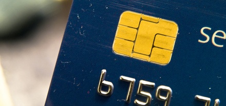 Close-up of a credit card's security chip. 