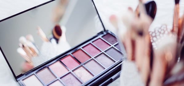 Makeup kit with a mirror inside. 