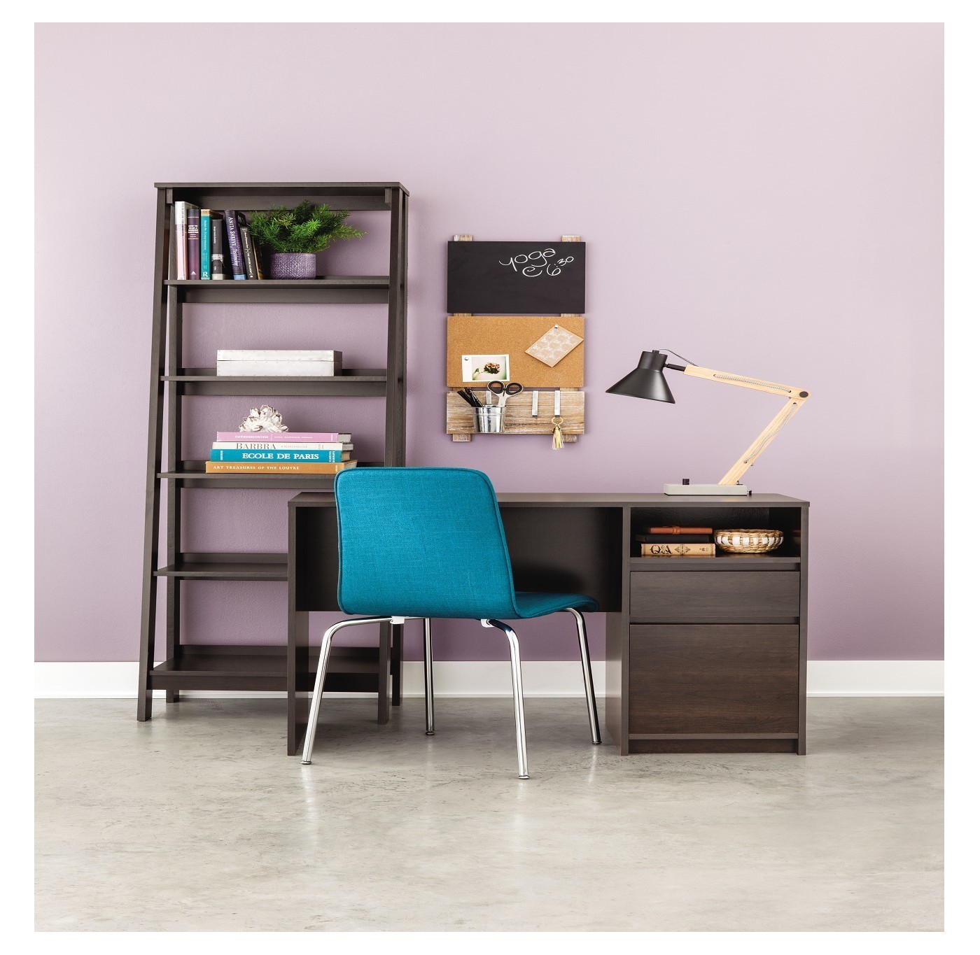 Brown wooden desk and ladder bookcase with a blue chair and decor from Room Essentials.