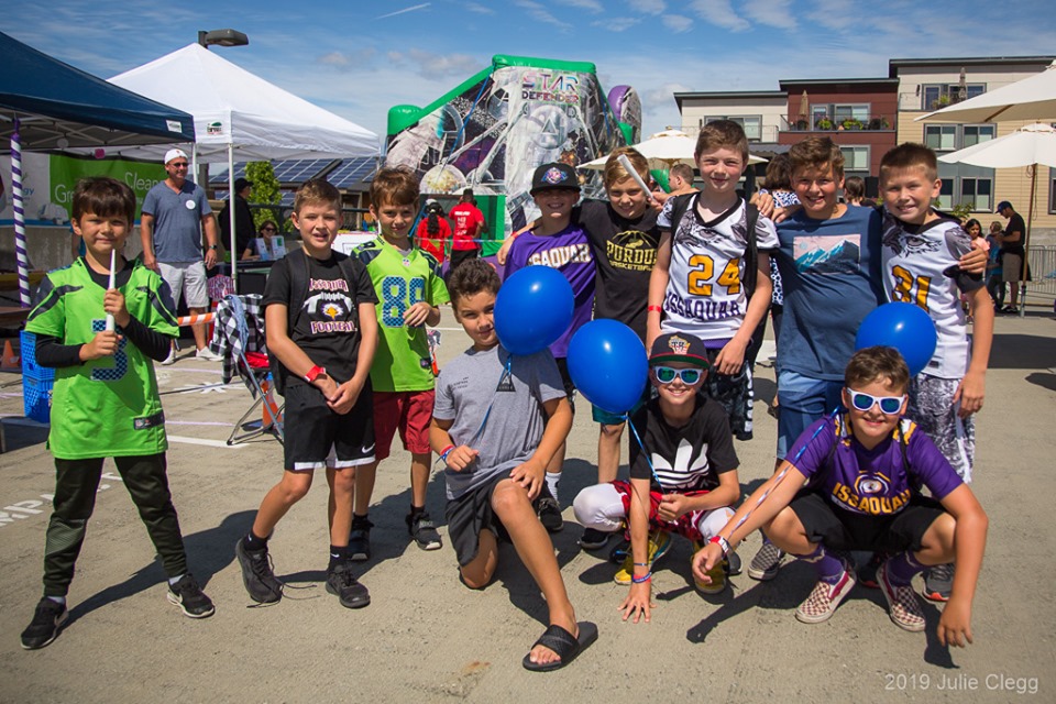 Group of young boys with blue balloons