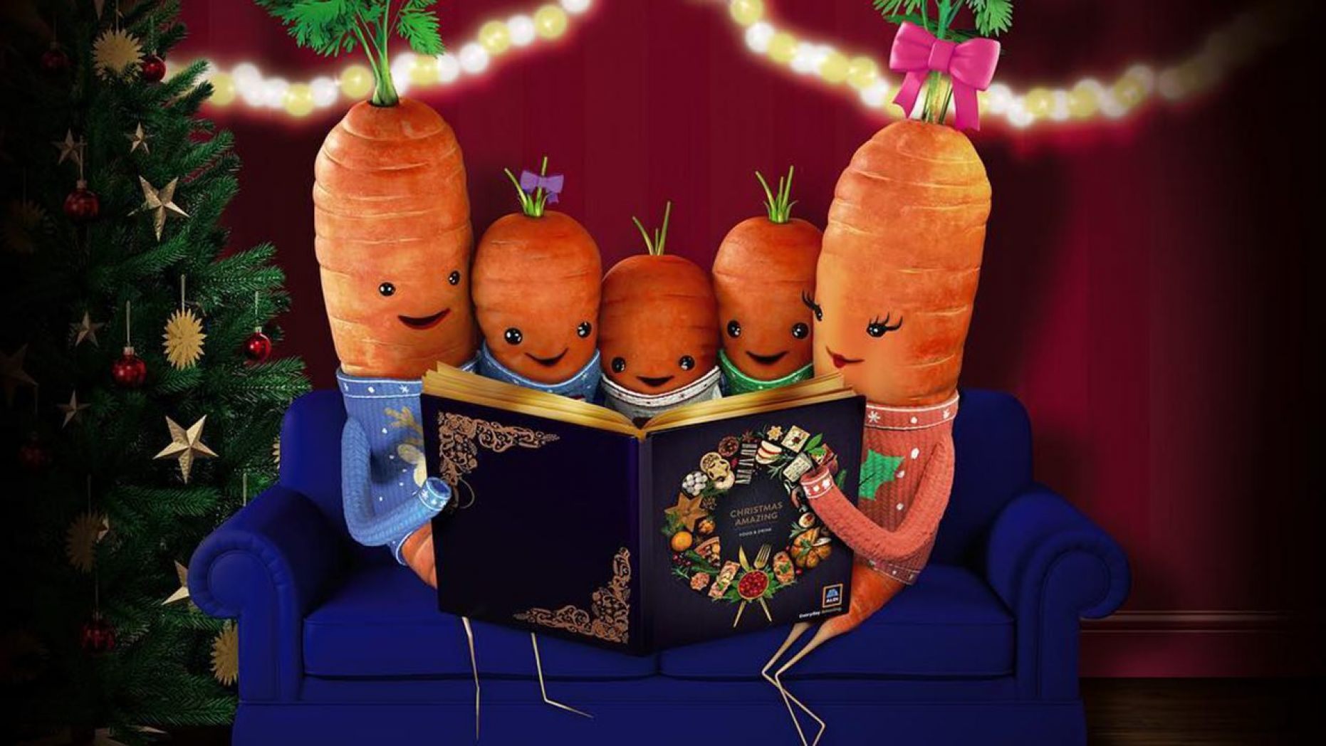 A family of carrots with faces on them reading a Christmas book. 