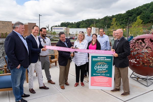 ribbon cutting ceremony at Chimney Rock plaza