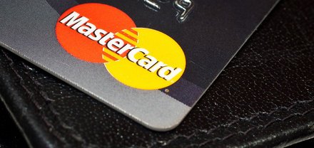 Close-up of a MasterCard logo on a credit card. 