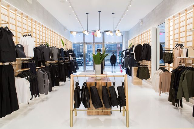 inside Lululemon store with black and white clothing hung on walls