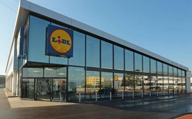 Lidl storefront covered with large windows. 
