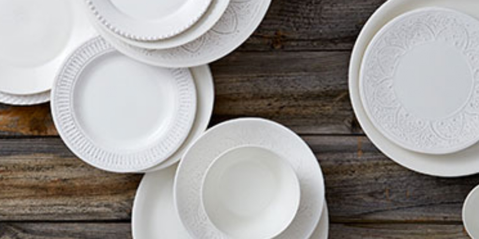 display of white dishes from HomeSense