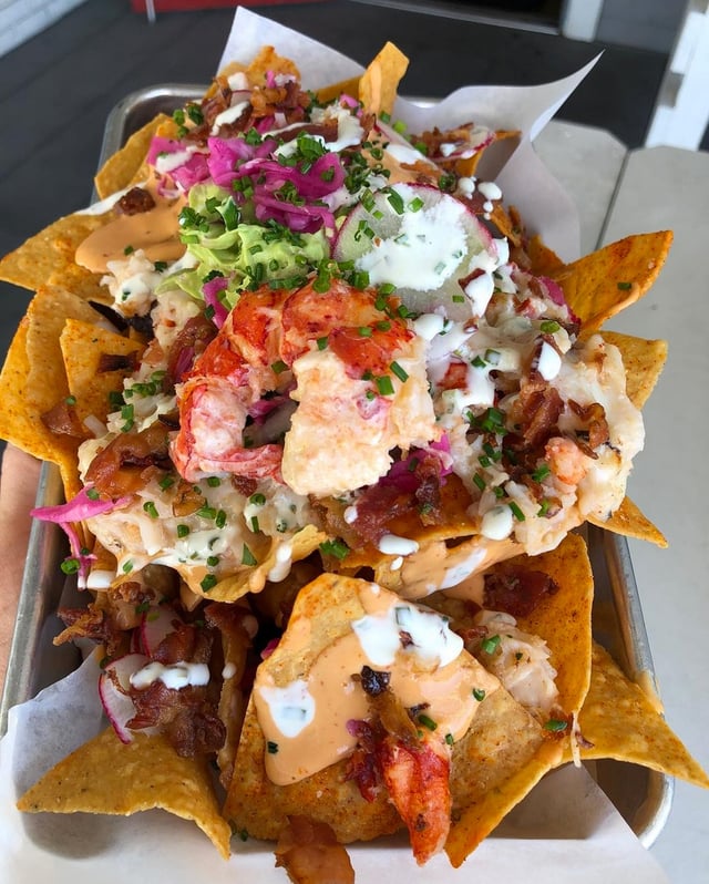 Nachos with lobster on top. 