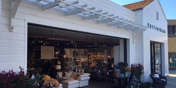 Pottery Barn storefront with an outside seating area. 