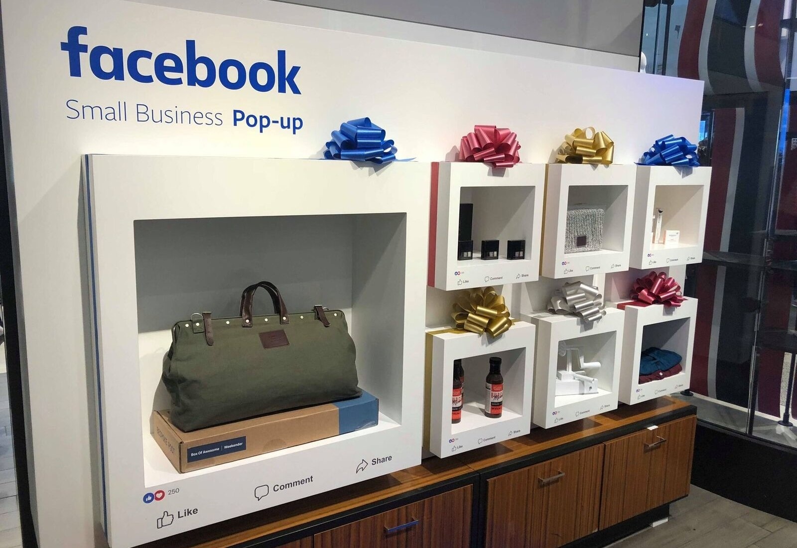 Small business goods on display in facebook pop up store, made to look like physical digital posts. 