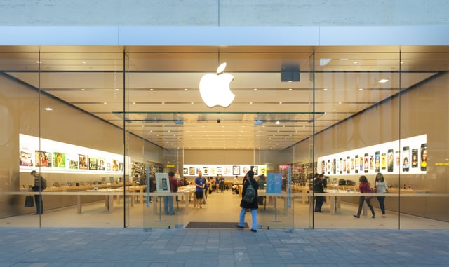 Apple storefront with floor-to-ceiling glass. 