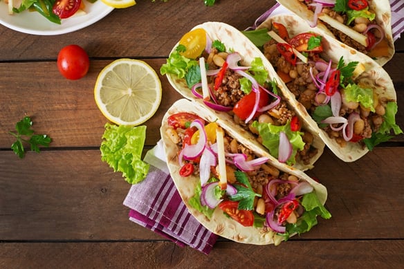 Overhead image of tacos on a table. 